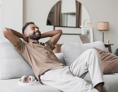 Man resting at home after dental appointment